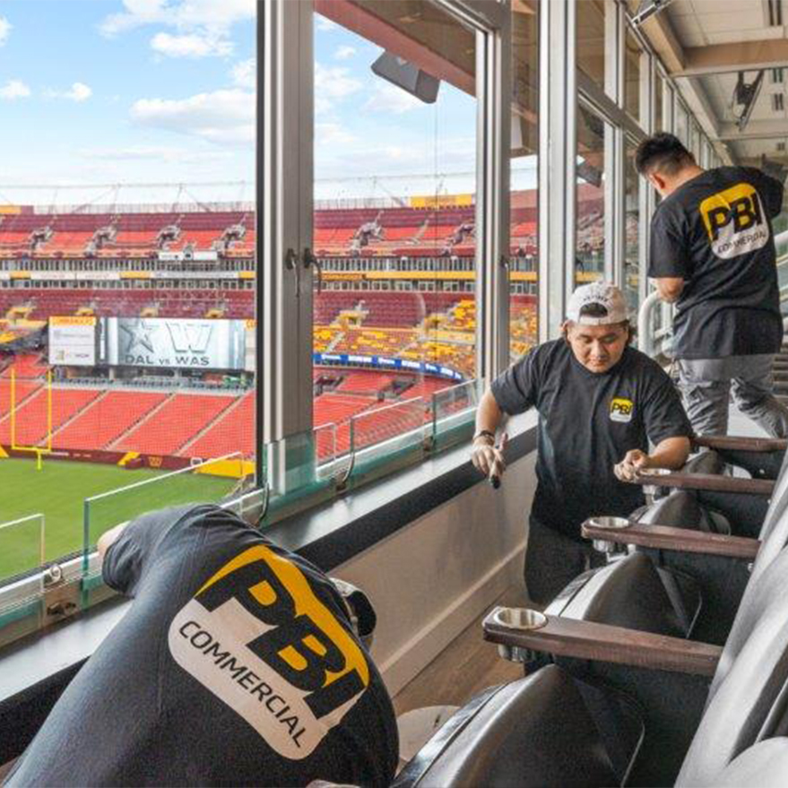 PBI workers painting the box at fedex way